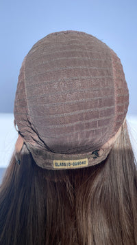 Inside back of the Shevy wig cap showing its sewn label.