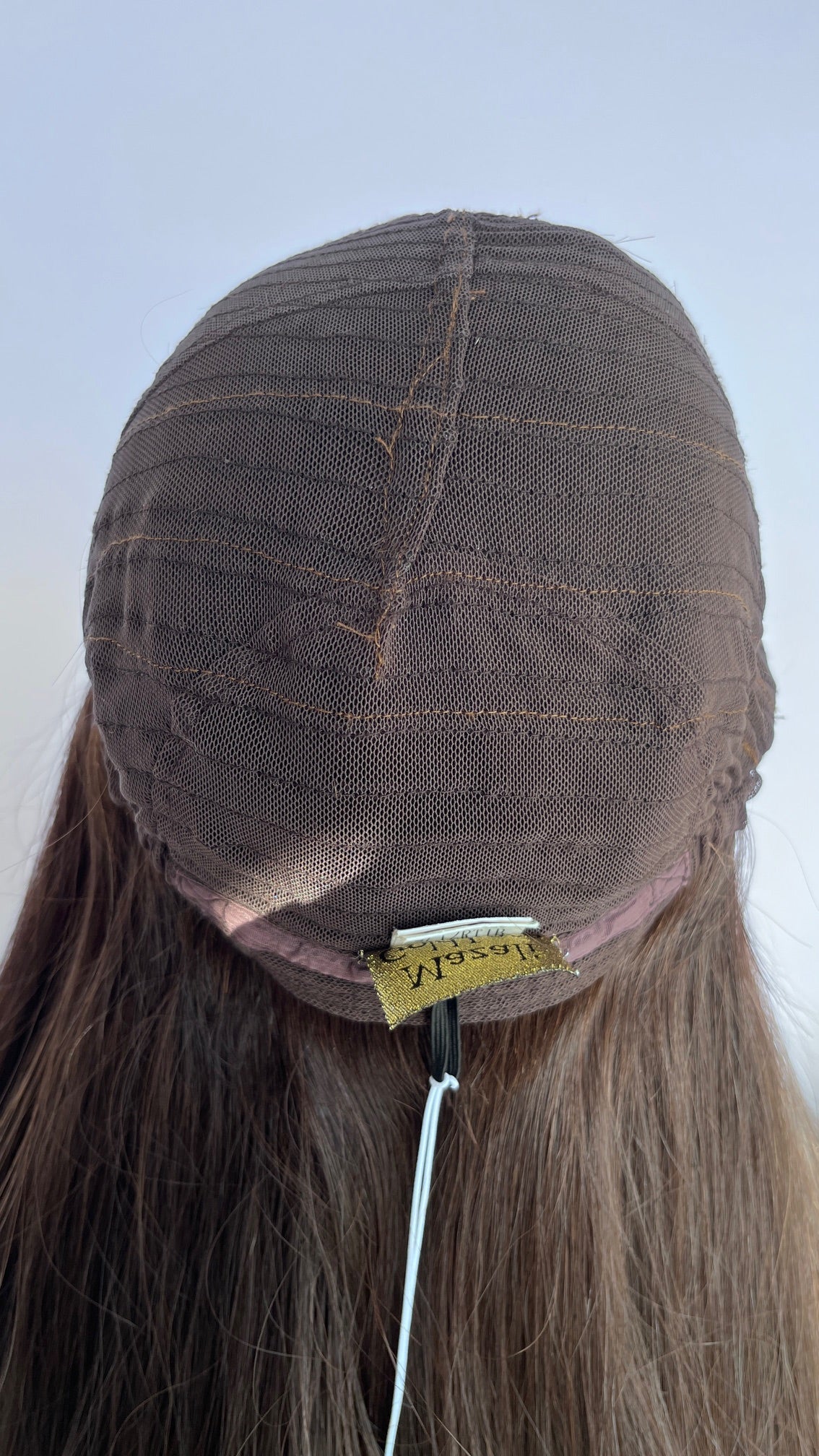 Inside back of the wig cap with its sewn Mazali label