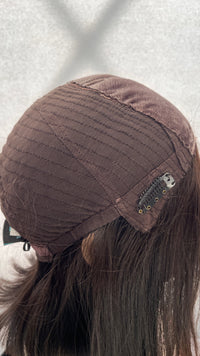 Inside side view of the Fortune wig's mesh cap and clip