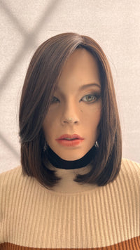 Front view of the dark brown Fortune wig with a straight blunt cut on a mannequin