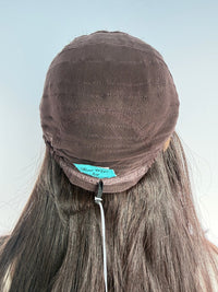 Inside back of the Tuni wig cap with its sewn maker label.