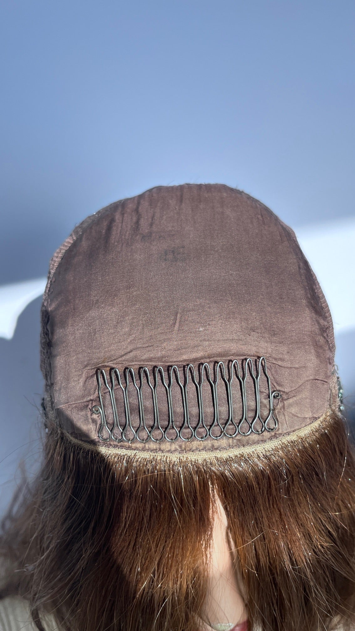 Inside front of the Shevy wig cap showing the lining and comb.