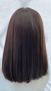 Pre-owned Mazali wig, back view.