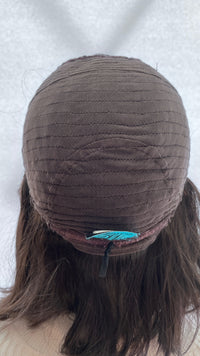 Inside back view of the Fortune wig's mesh cap and sewn label