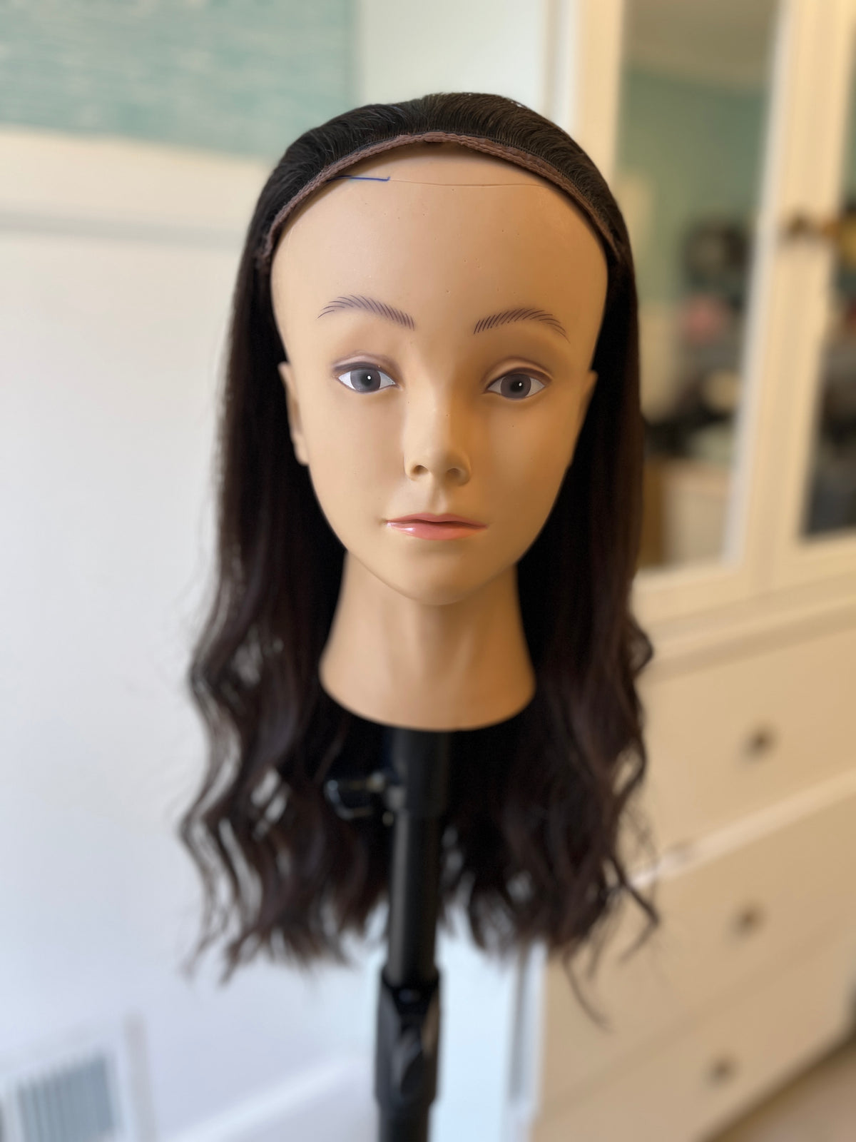 Pre-owned band fall - front view with a black headband and dark waves.