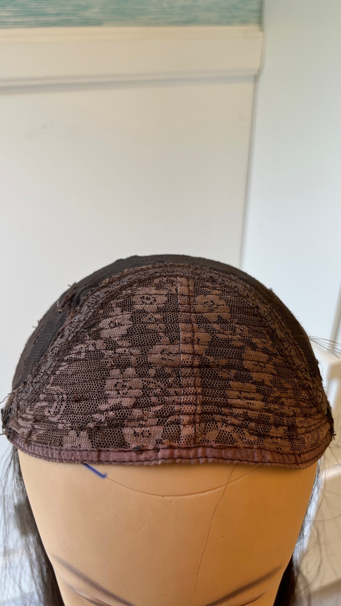 Pre-owned band fall - front of the inside cap and comb.