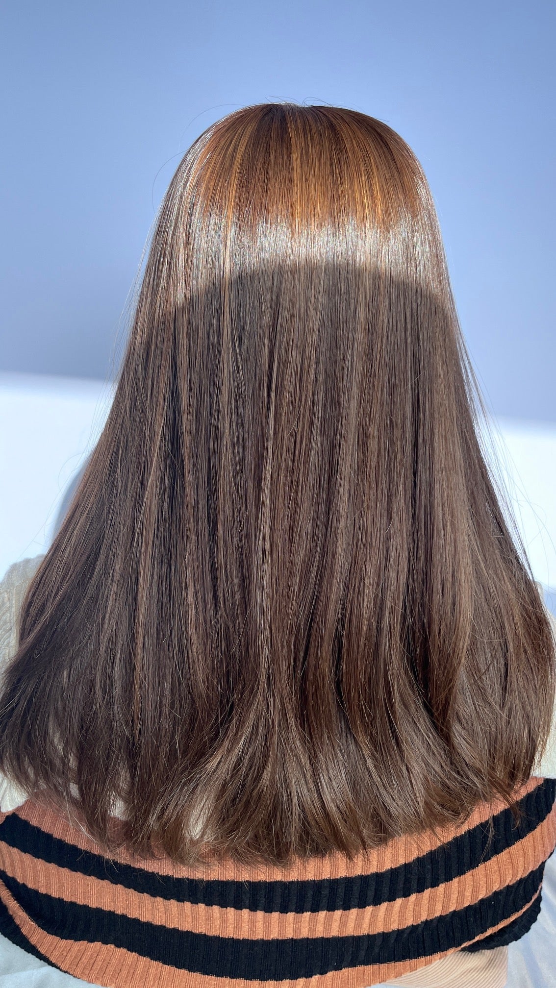 Back view of the Shevy wig showing the hair and ends.