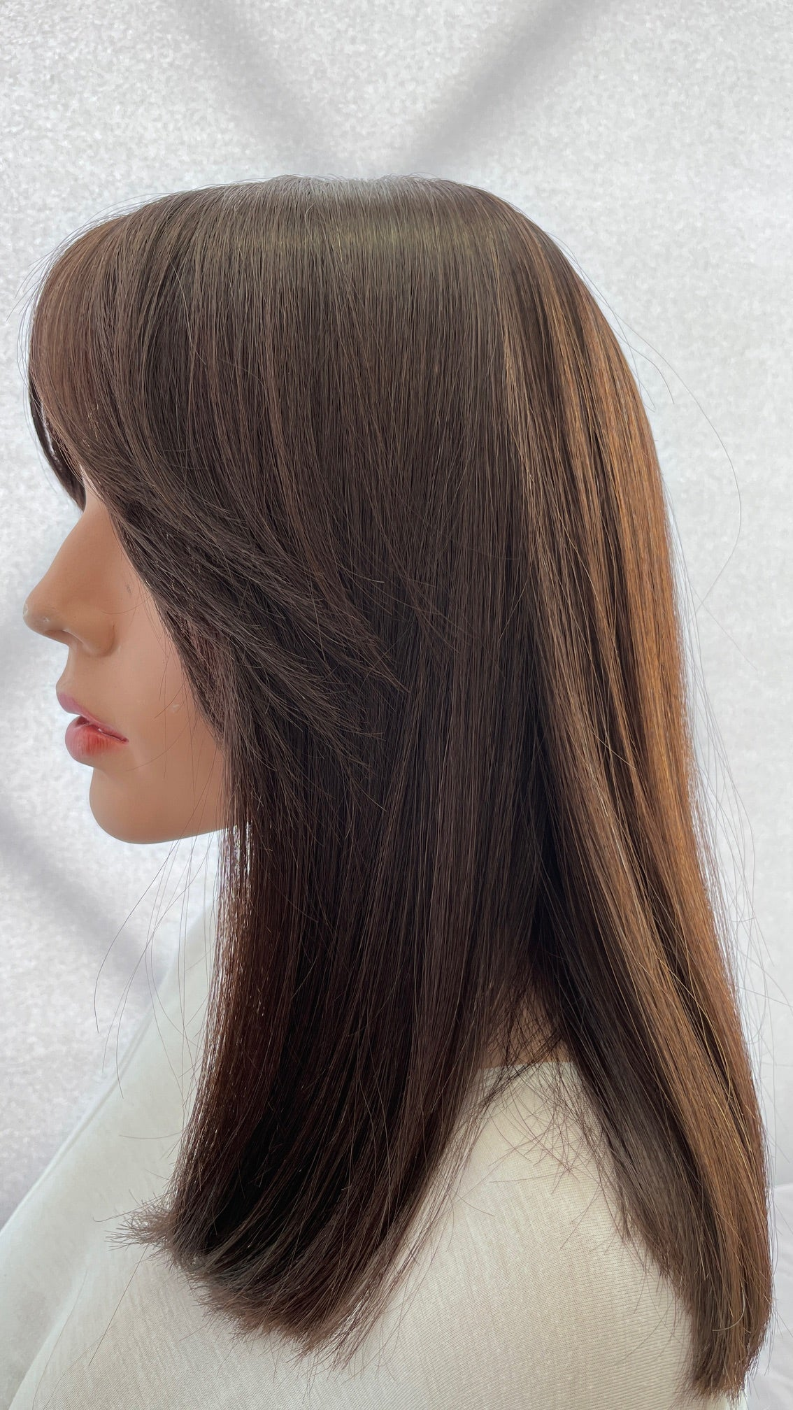 Pre-owned Mazali wig, side view.